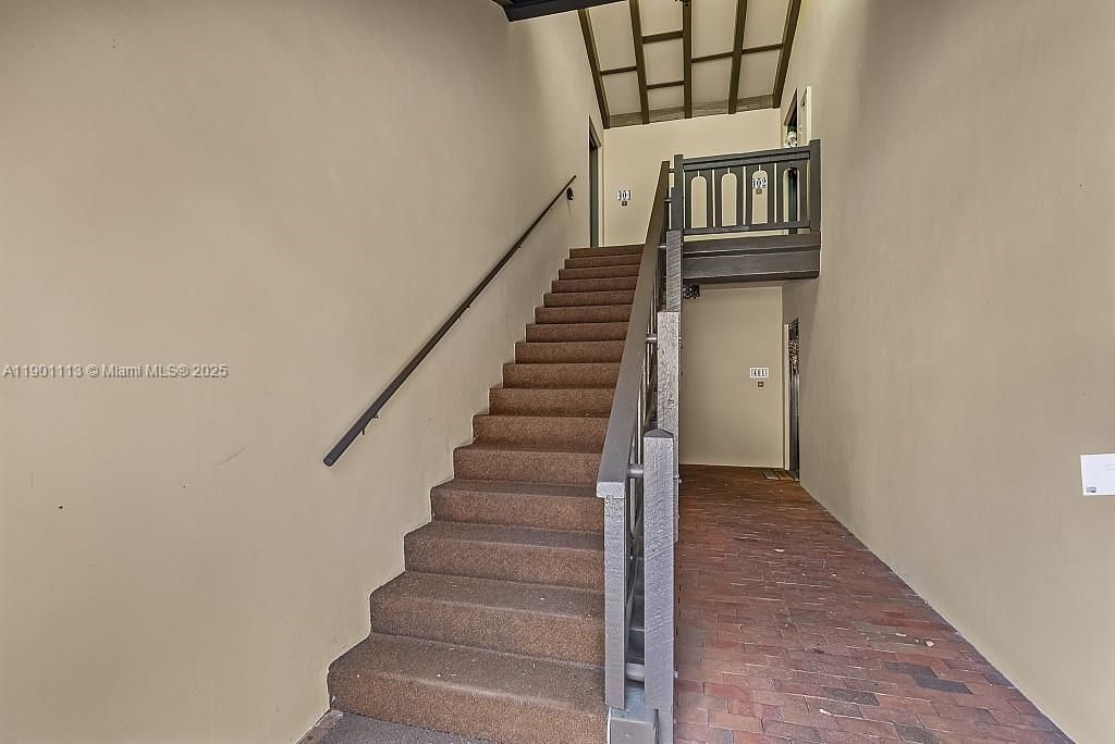 Entry with original brick floors.