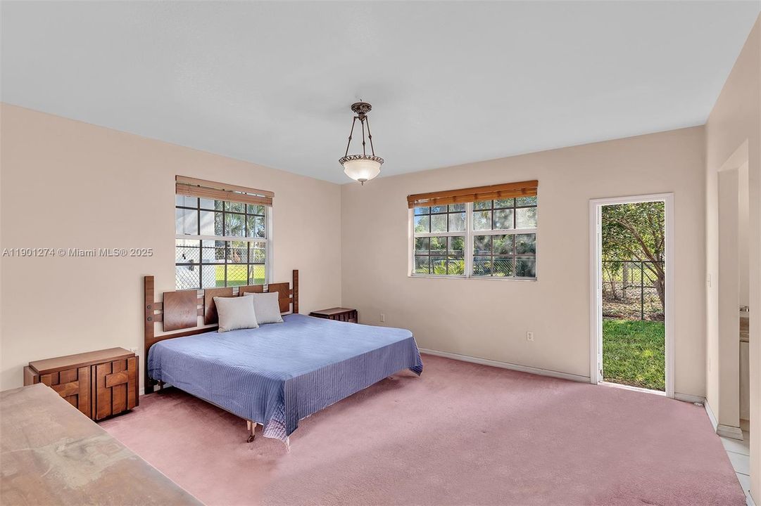 Large Master Bedroom, door opens to backyard