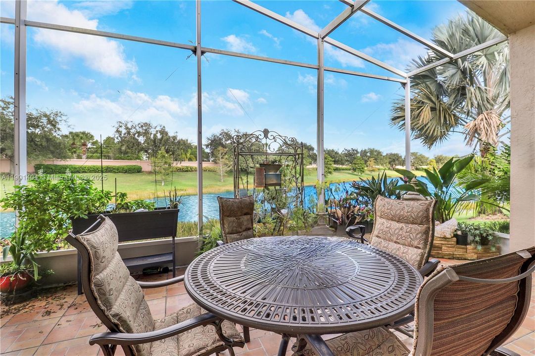 Screened patio with private water view