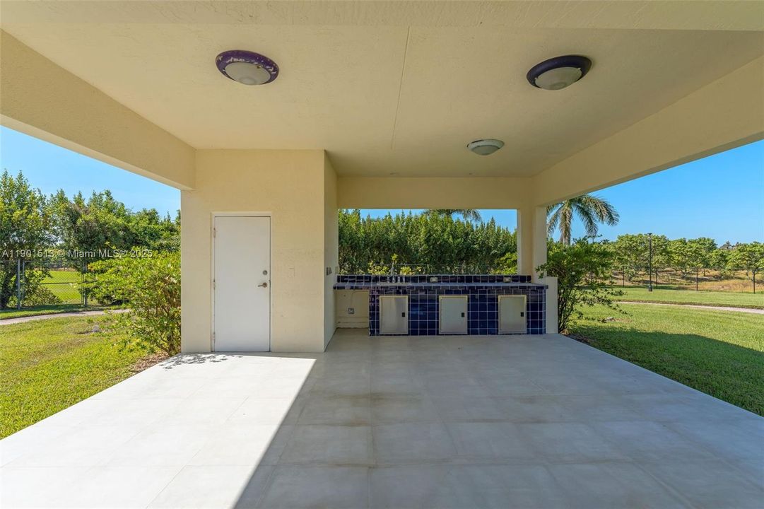 CABANA WITH SUMMER KITCHEN AND POOL BATH