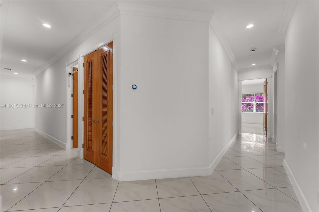 HALLWAY OFF OF GREAT ROOM TO 2ND PRIMARY SUITE, SUITES/ OFFICES ETC.