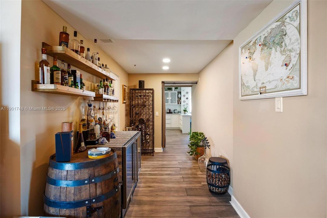 Connection between family room and kitchen (laundry room is in the middle of the hallway)