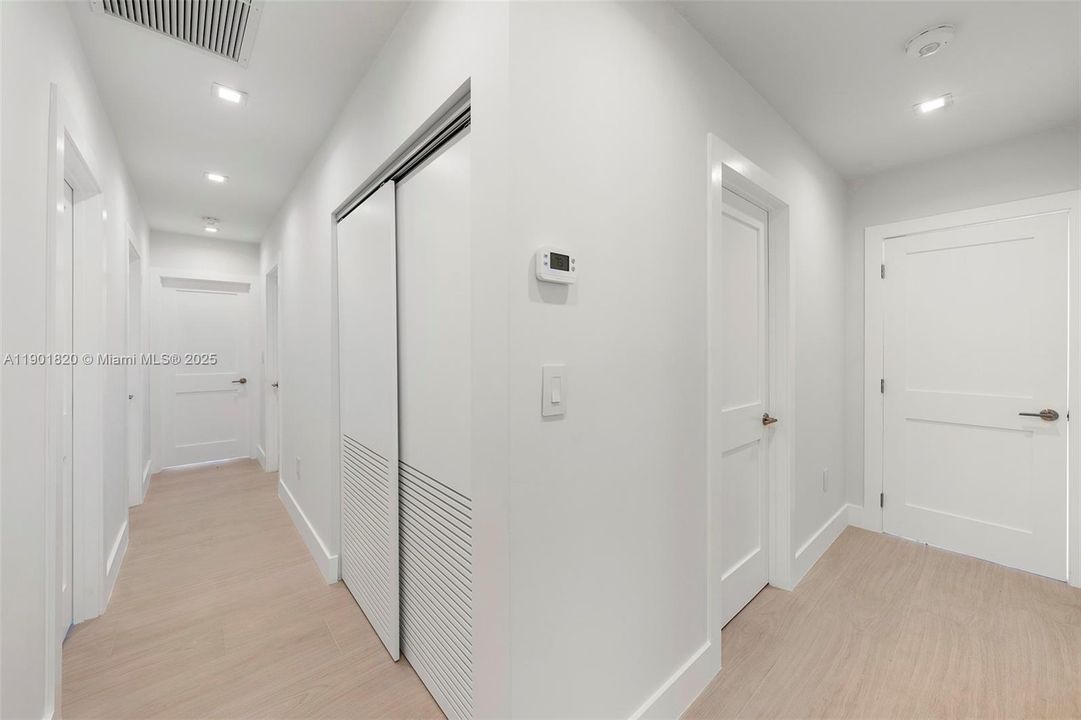 L shaped hallways - connects bedrooms to living room