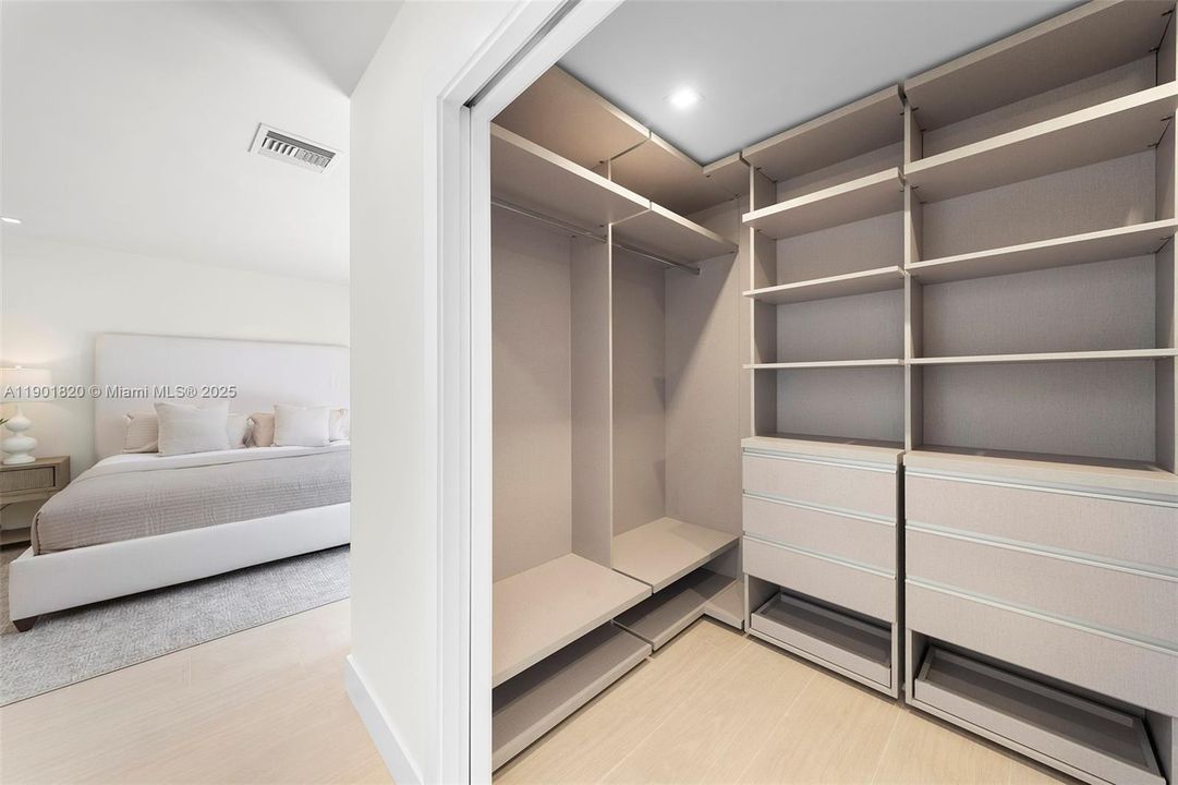 Primary Bedroom Walk in Closet - custom made