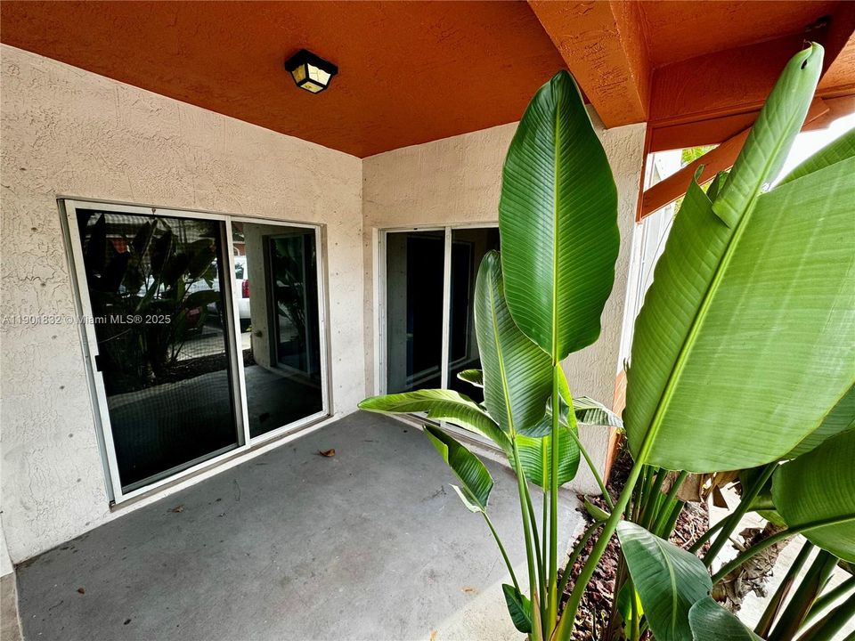 Private porch with access from Dining and Living Room