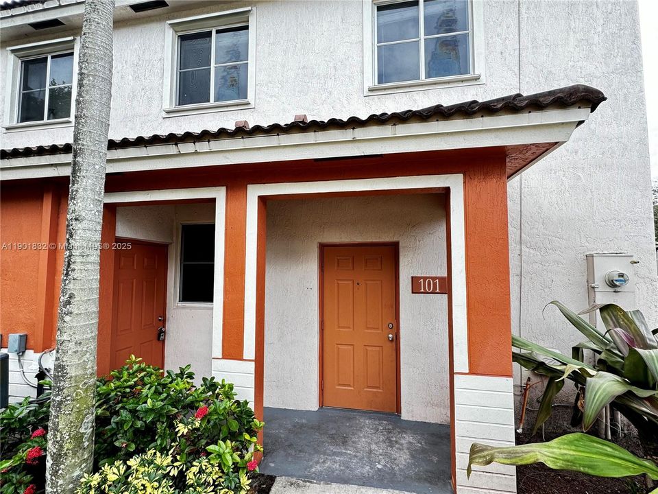 Left door is a storage room. Right door is the main entrance to the unit.