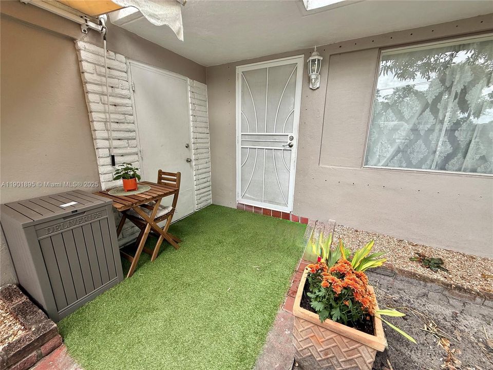 Front door to home and to finished garage full bath