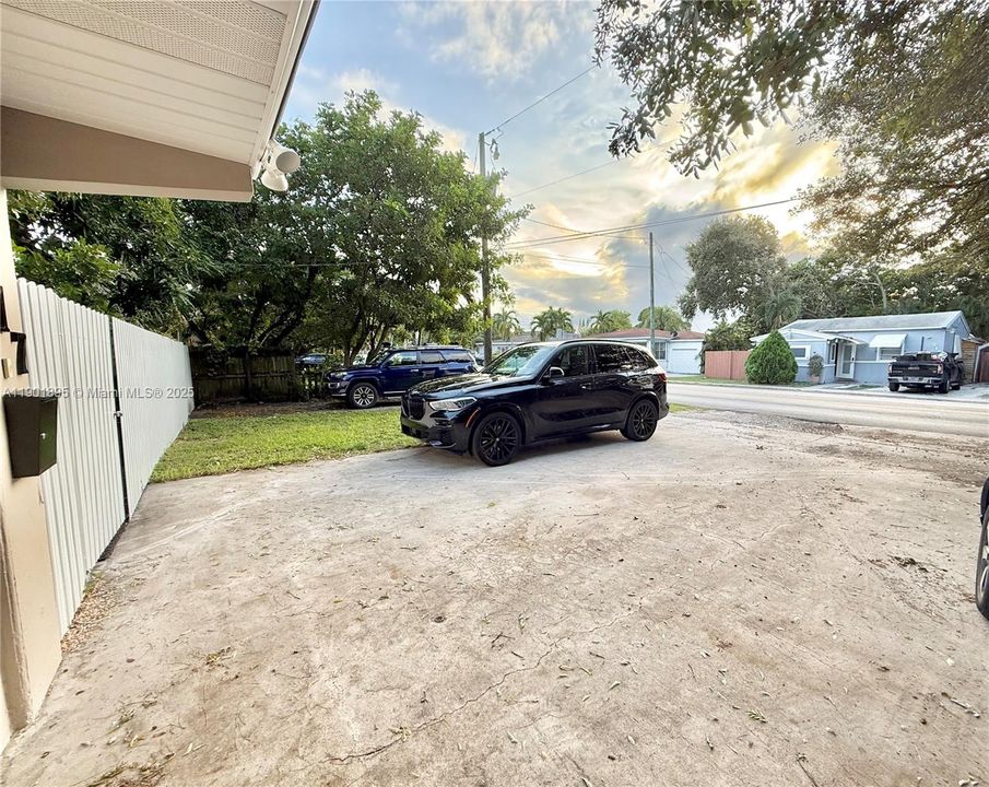 Parking for 4 cars + additional vehicle in front yard with a gate large enough to fit your RV / Boat etc. NO HOA maybe park your commercial vehicles there no rules on that. Free advertising for your business.