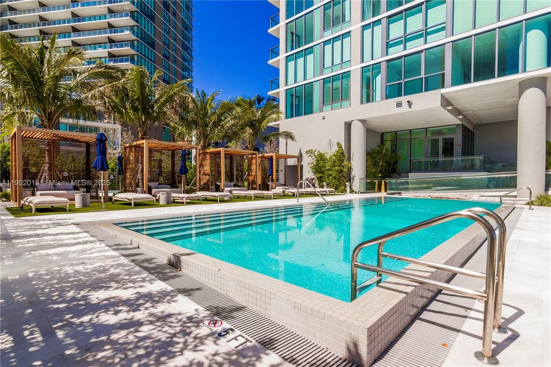 Ground-floor pool & cabanas overlooking Biscayne Bay