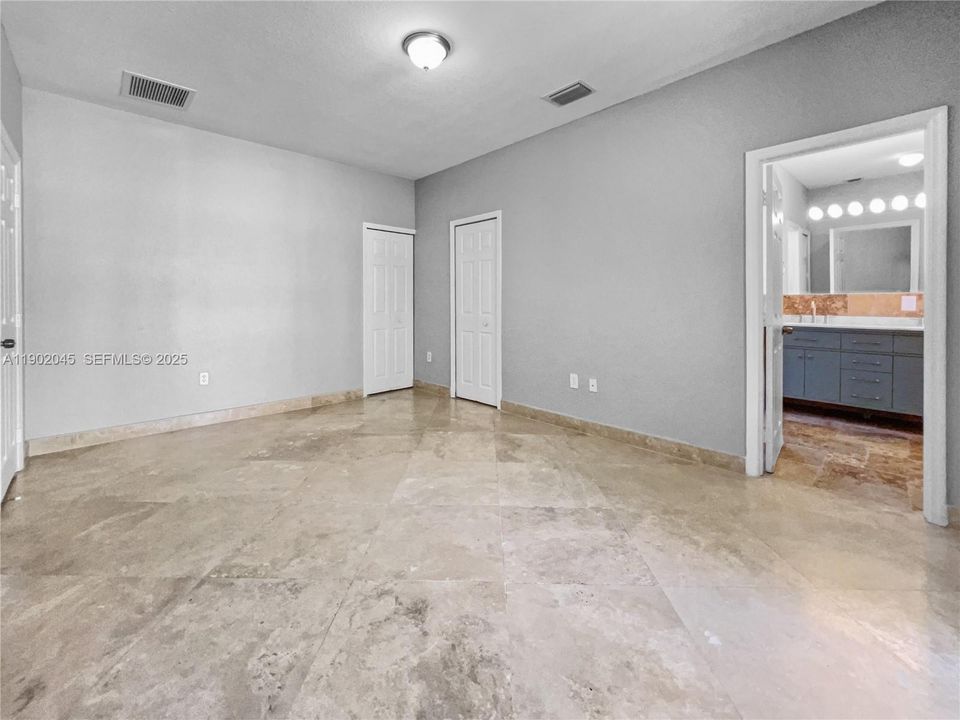 Primary Bedroom with two walk in closets.