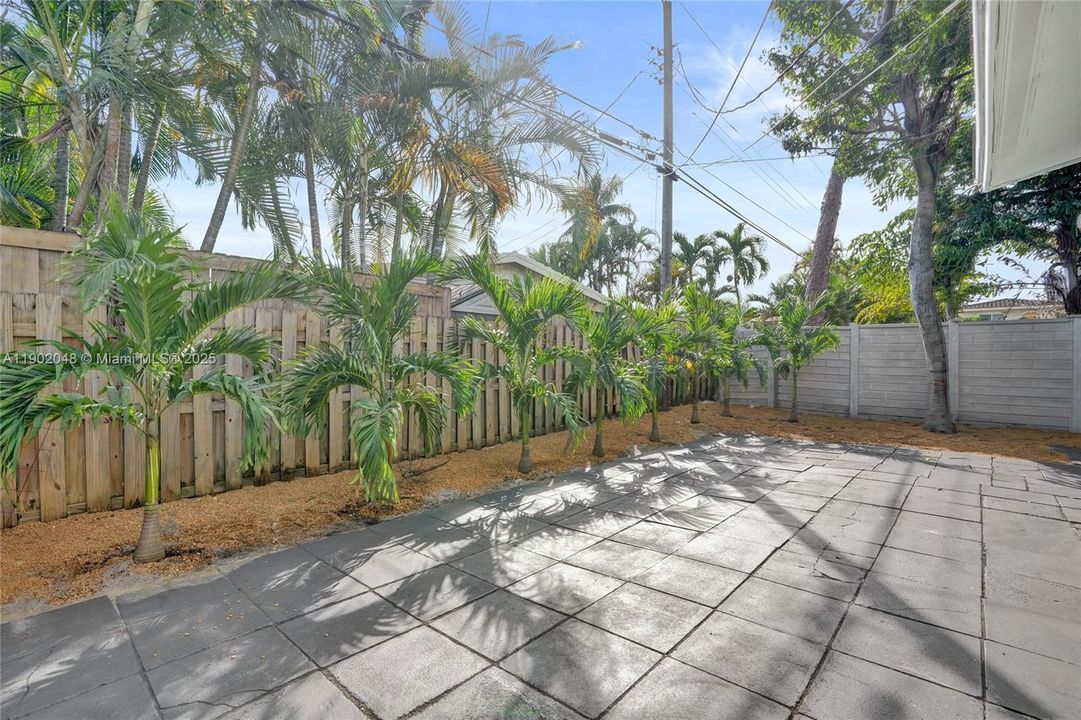 Unit 2 - Wrap around private and fully enclosed backyard. Wooden fence is being replaced with permits by next door neigboor.