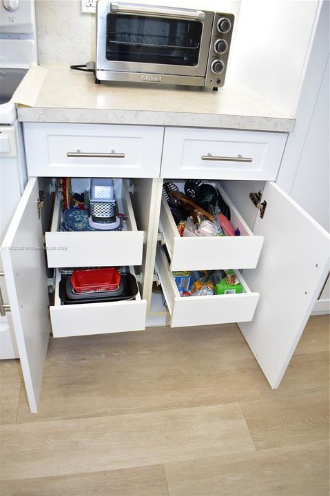 All cabinets have pull out shelves
