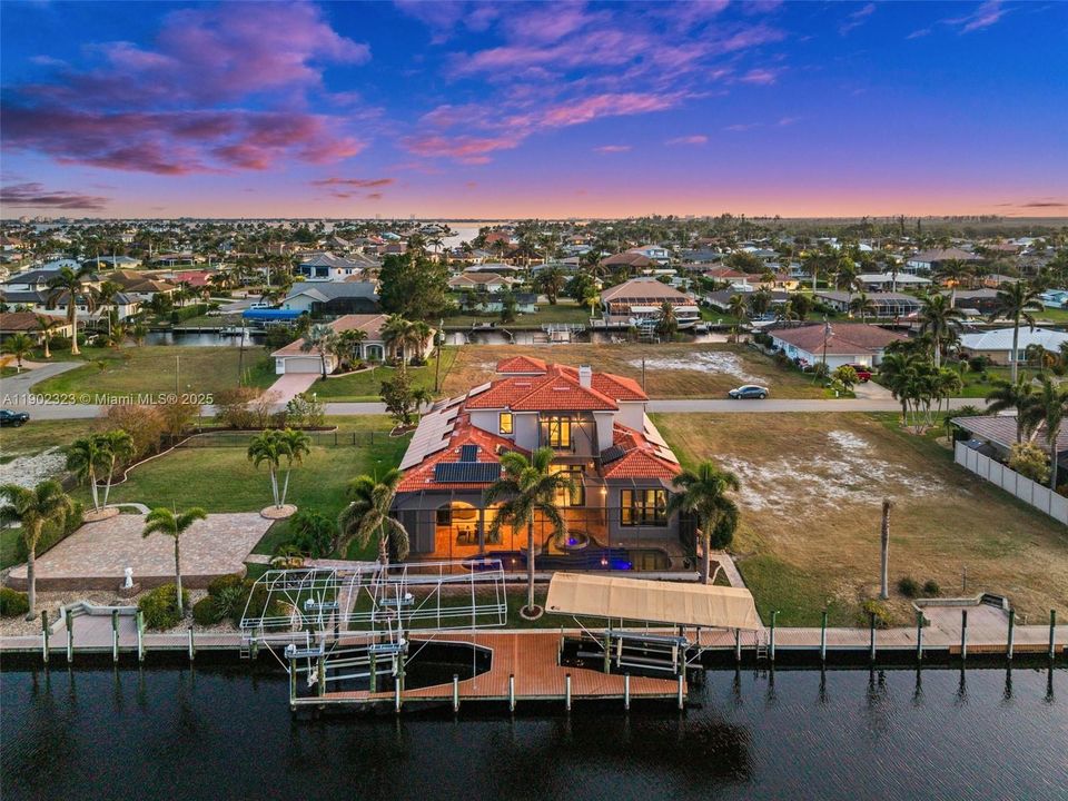 Evening View of the house from the water