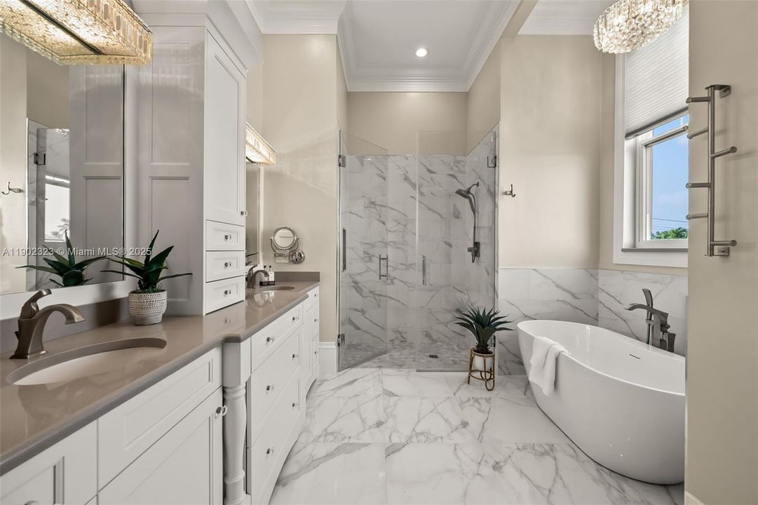 Master Bath with Dual Sinks and Glass Walled Shower...
