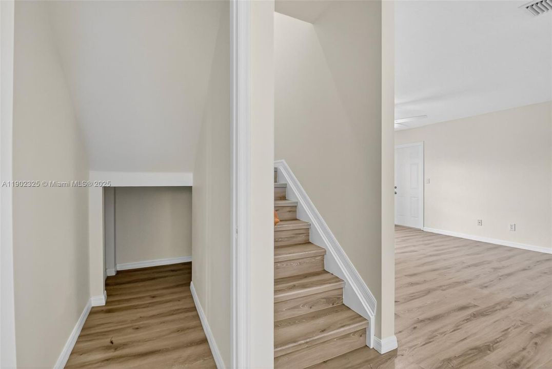 large roomy under stairs storage area
