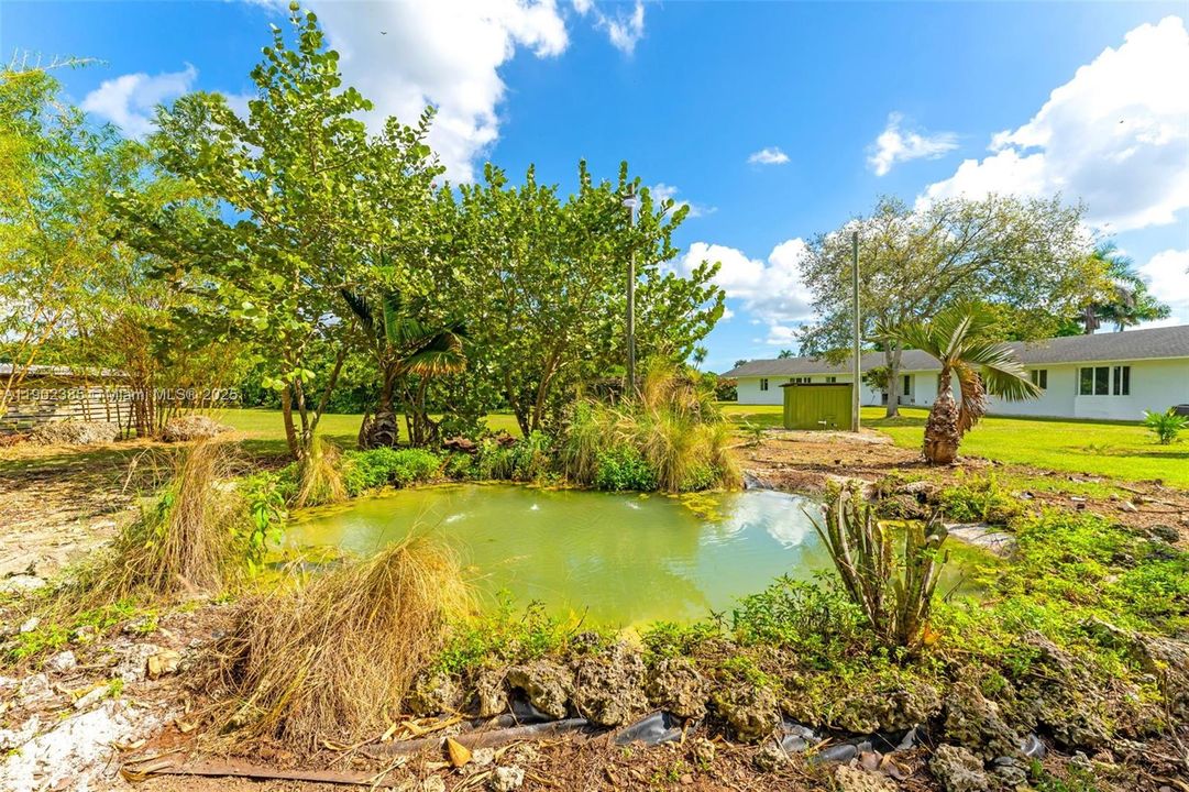 1 OF 2 WATER FEATURES, IN THE FRONT OF THE PROPERTY AS YOU DRIVE IN.