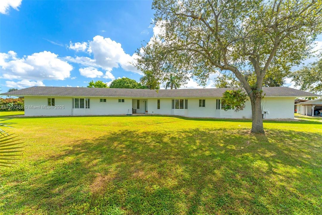 MAIN ENTRANCE family uses rear...