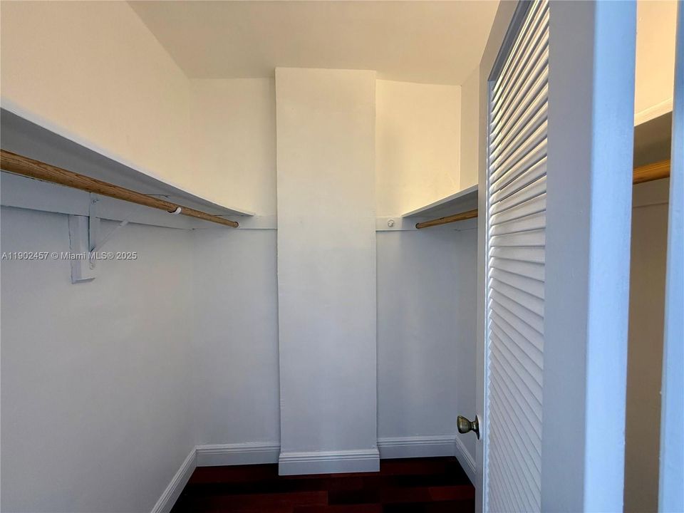 Walk-in closet in bedroom