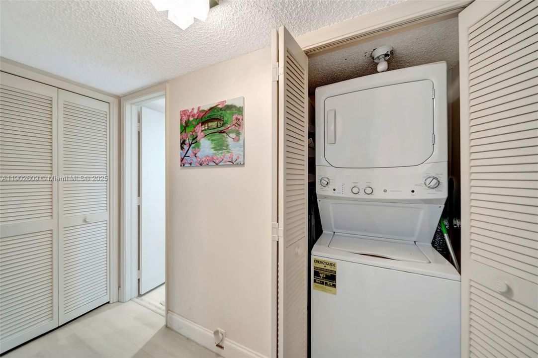 Convenient in-unit washer and dryer tucked neatly behind closet doors — no shared laundry, no hauling baskets. Just easy, private access right where you live.