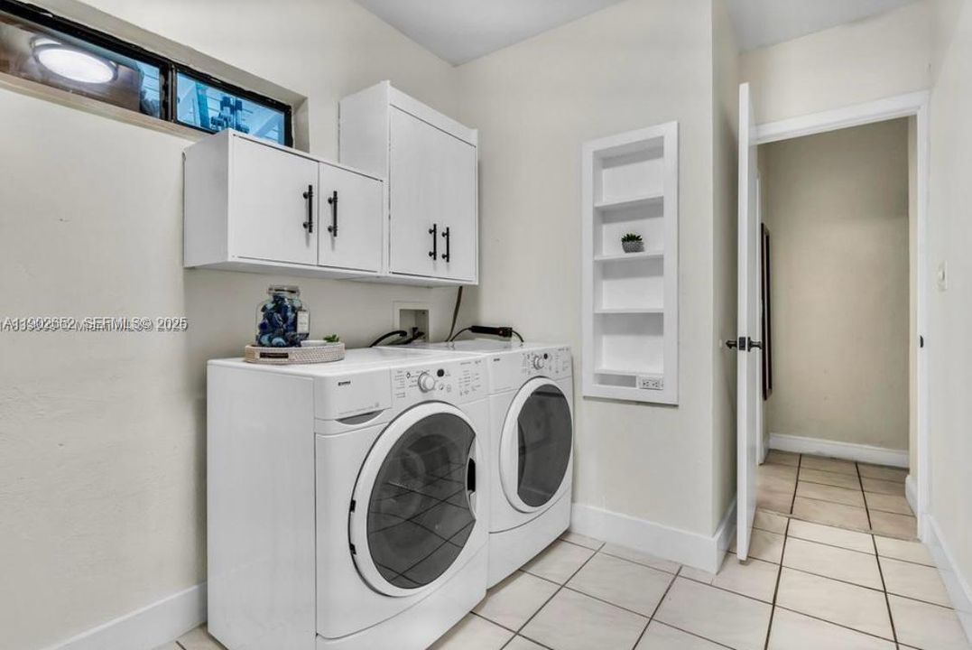 Large Laundry Room with Storage Closet