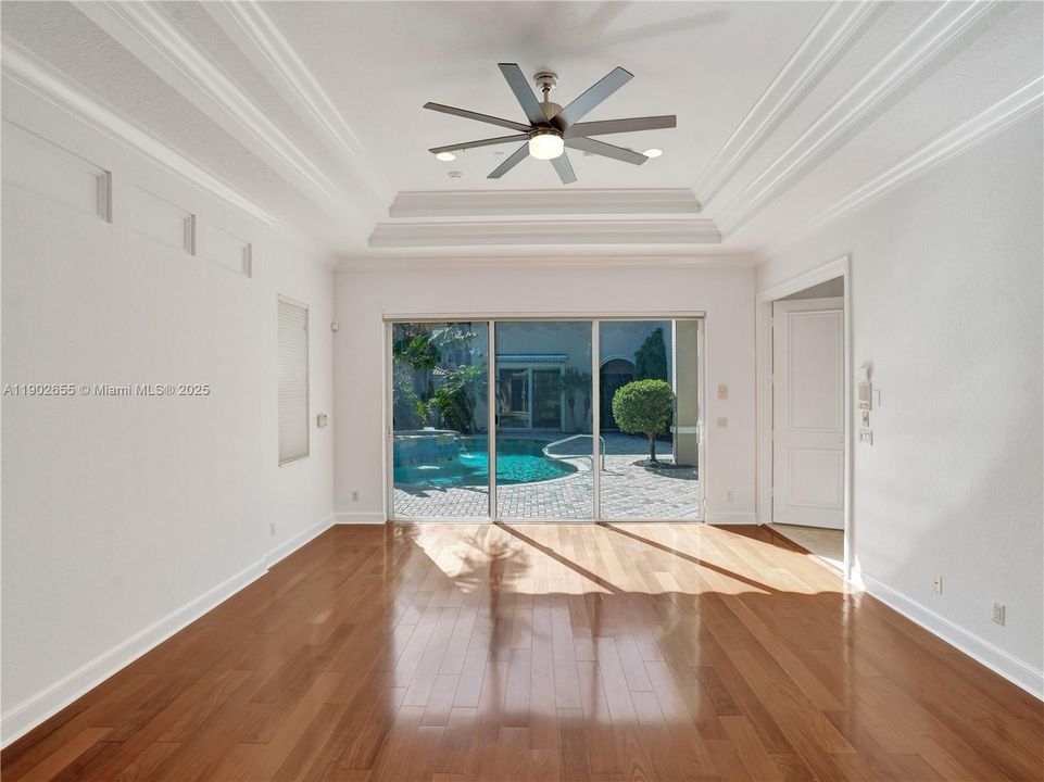 Large main bedroom with walk-out to pool area