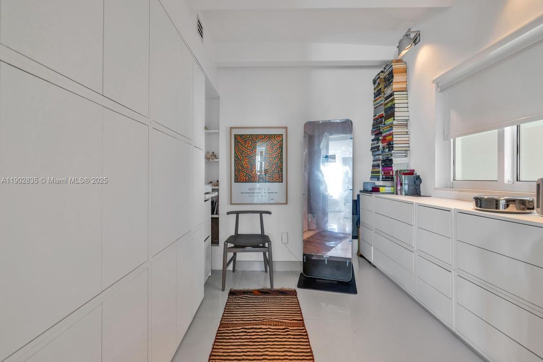 Can be used as a guest suite, or office/ den, Storage units can be removed, creating more space.