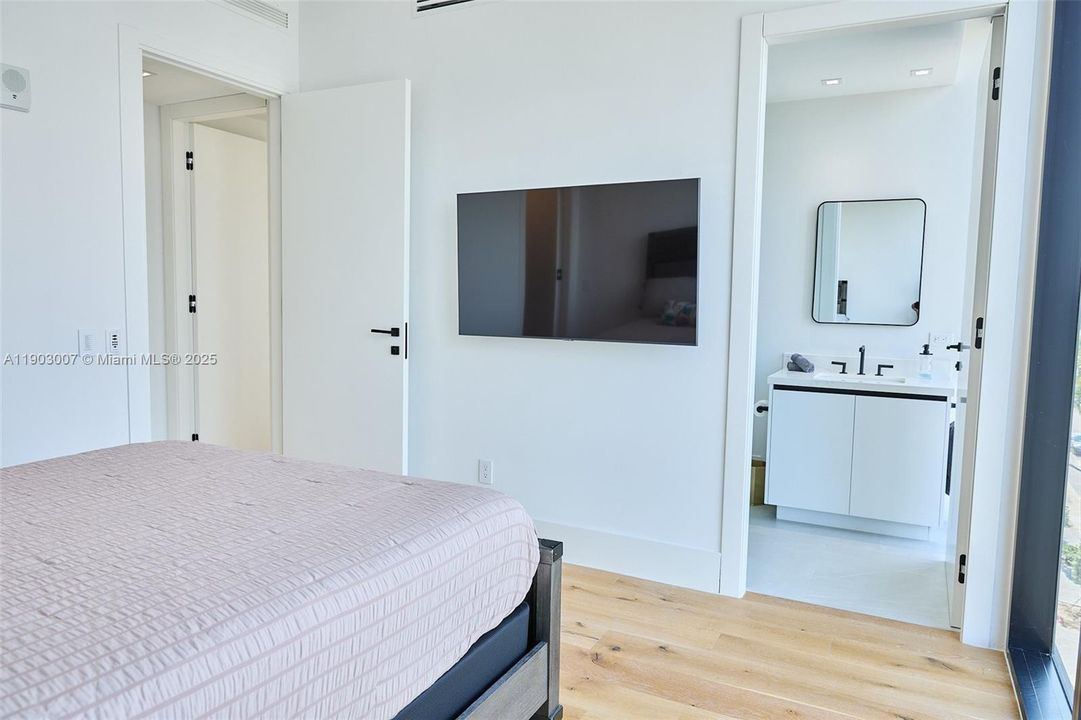 Mounted TV in bedroom