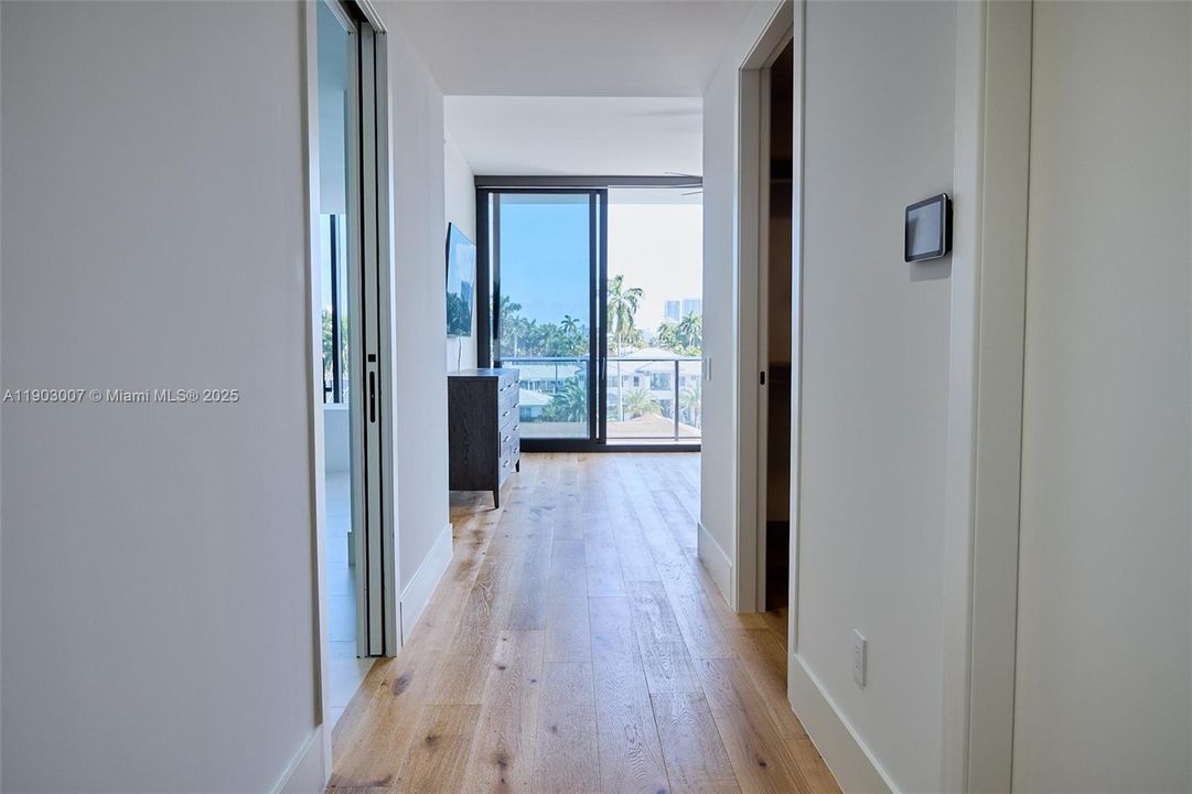 Hallway into primary bedroom