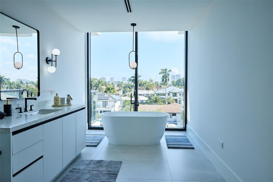 Soaking tub with waterfront views