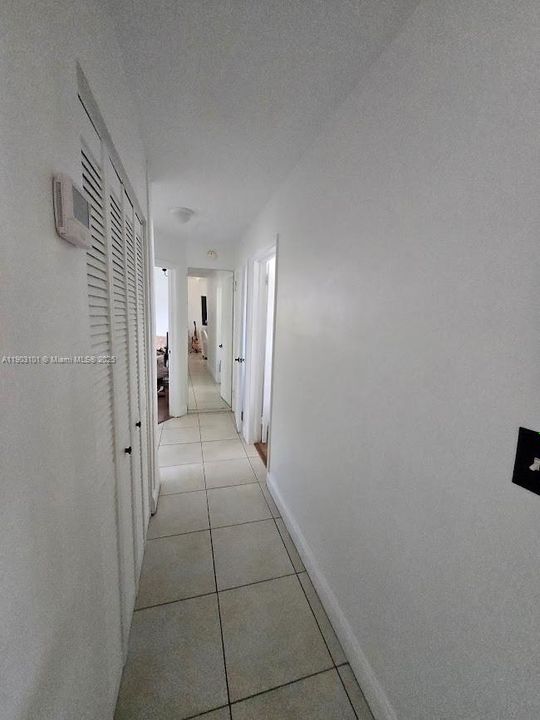 Hallway going in to the bedrooms and bath.
