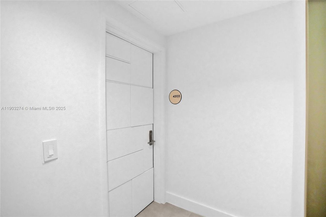 This 42nd floor unit has a private foyer and a semi-private elevator.