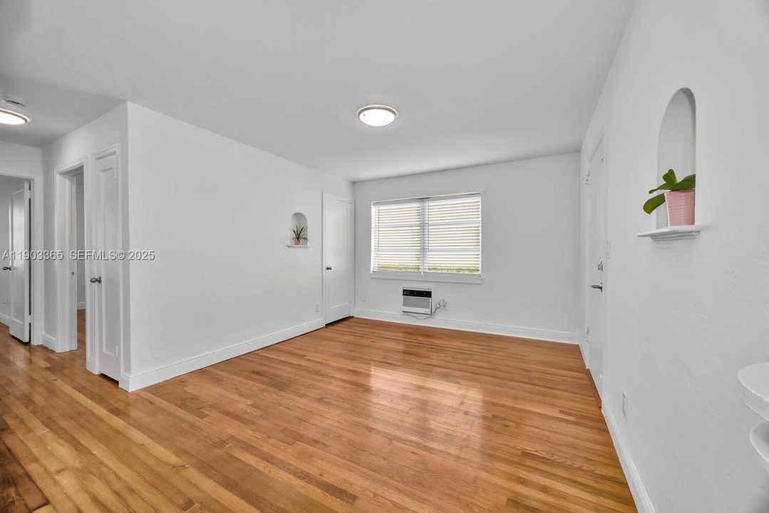 Corner unit. Excellent layout, wonderful wood floors.