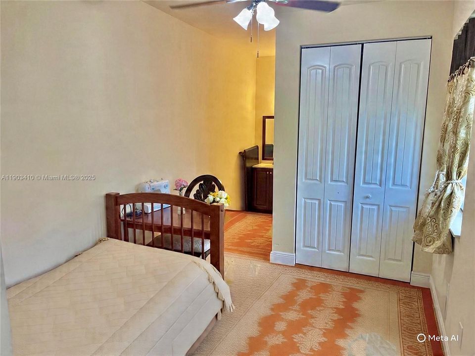 3rd bedroom down-stairs staged