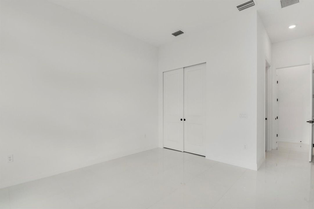 Bedroom 1 Closet and Bathroom 1 Door