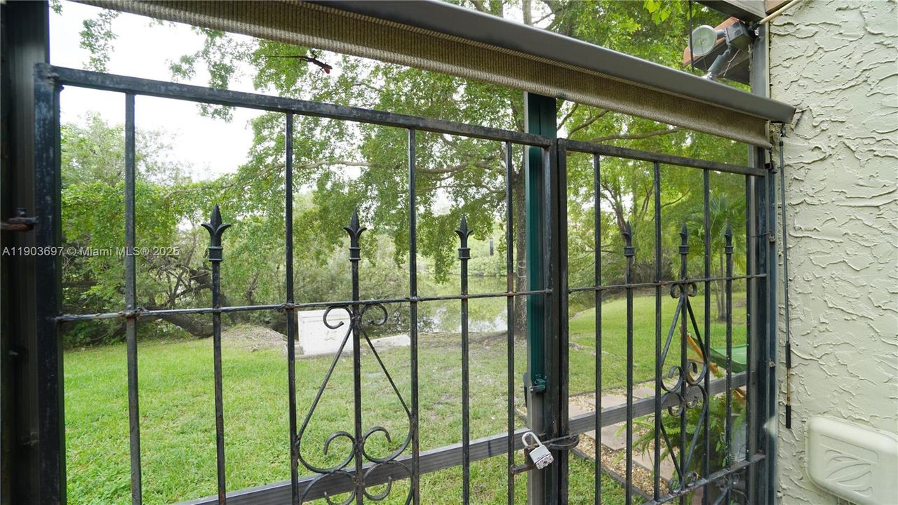 When the roll-up is up, one sees the lake and tranquil green area..