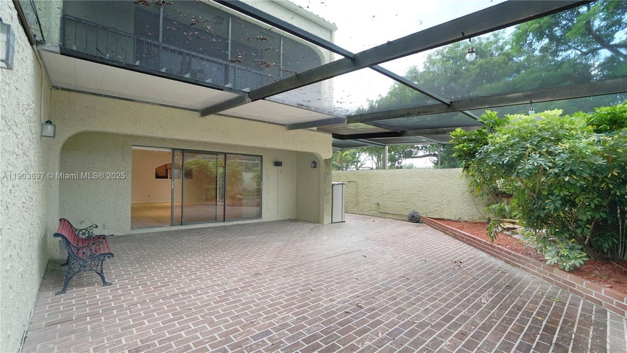 A second view of the patio. Could be a pet sanctuary, completely secure.