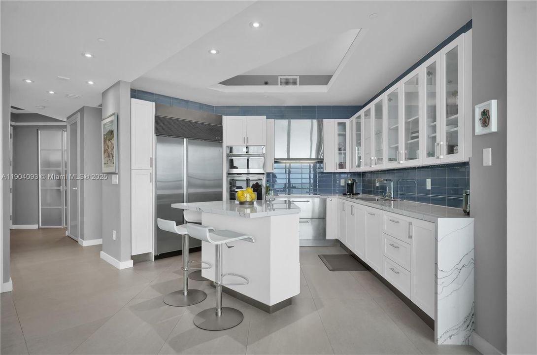 Modern culinary space, stone counters.