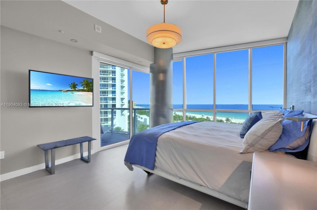 Serene primary suite, ocean horizon.