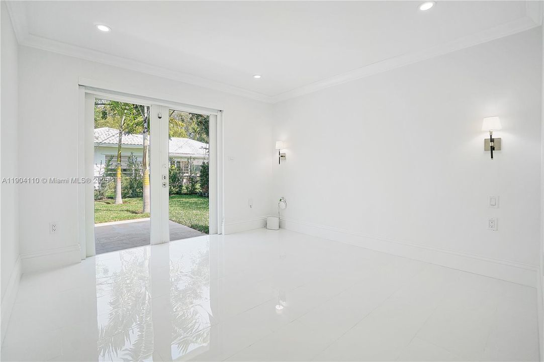 Primary Bedroom overlooking the backyard.