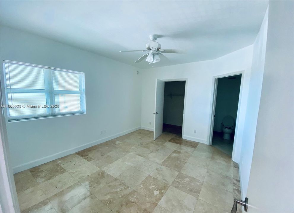 Second bedroom with large walk in closet and en suite bathroom