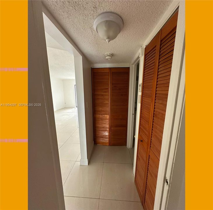 WALKWAY FROM SECOND BEDROOM