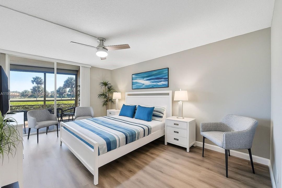 Primary Bedroom with spectacular view of the Dunes Golf Course