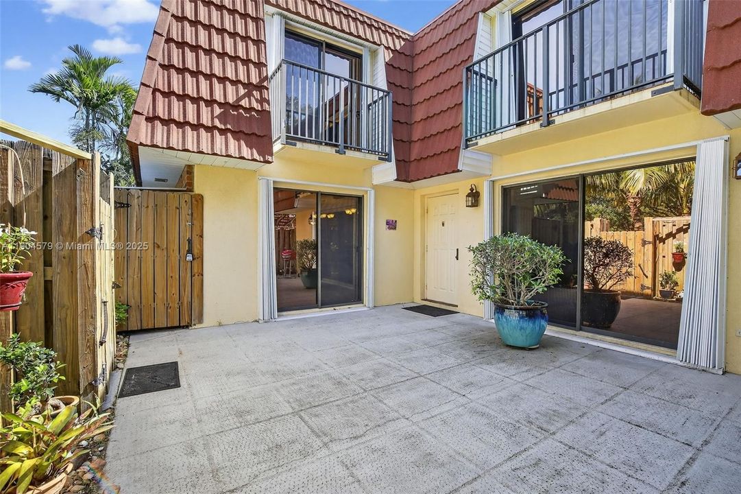 Private fenced-in courtyard perfect for entertaining, relaxing, or BBQs with friends and family.