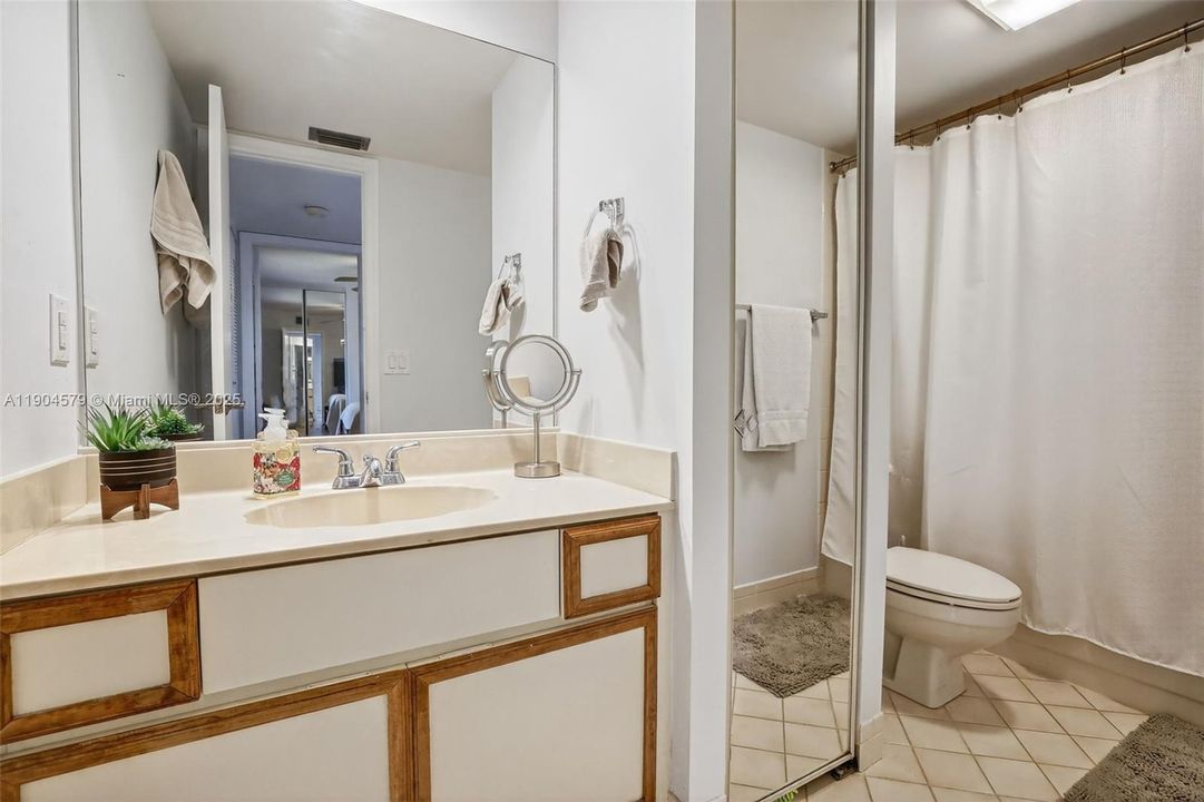 Full upstairs bathroom with updated fixtures, linen closet and modern touches.