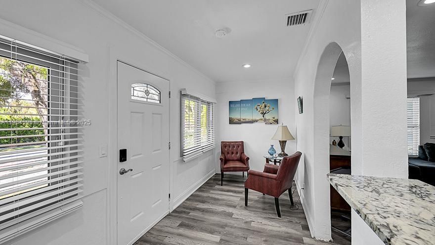 Arched Walkways, Baseboards Wall, Crown Molding, Drywall, Natural Light, Recessed Lighting, Smoke Carbon Monoxide Detector, Vent, Wood Finish Floor, Smoke Carbon Monoxide Detector, Vent