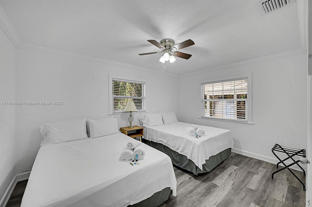 Baseboards Wall, Ceiling Fan, Crown Molding, Drywall, Natural Light, Vent, Walk In Closet, Wood Finish Floor, Drywall, Natural Light, Wood Finish Floor