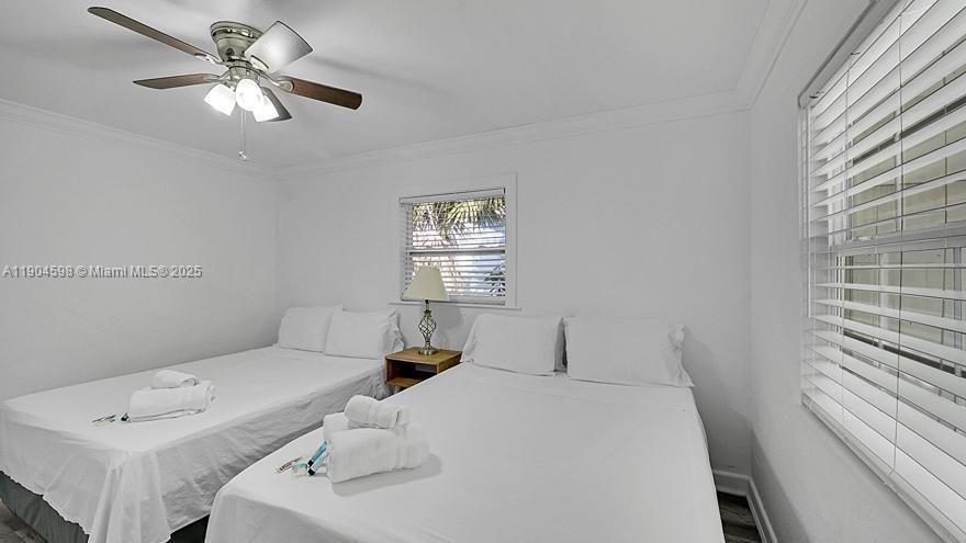 Baseboards Wall, Ceiling Fan, Crown Molding, Drywall, Natural Light, Vent, Walk In Closet, Wood Finish Floor, Drywall, Natural Light, Wood Finish Floor