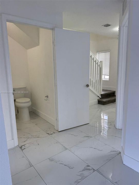 Down stair bathroom with shower.