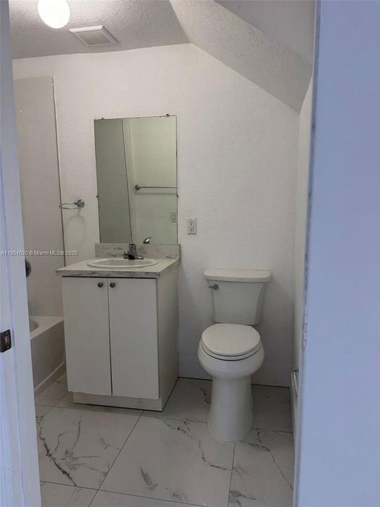 Down stair bathroom with shower.