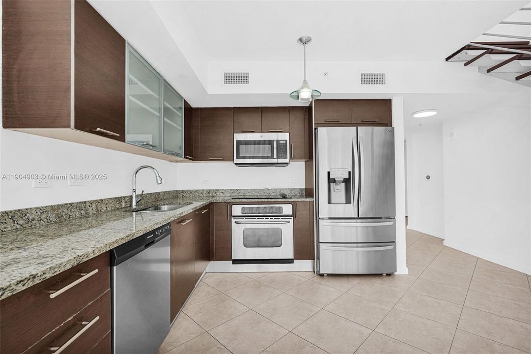 Other view Kitchen - Stainless Steel Appliances - Modern Light Fixtures